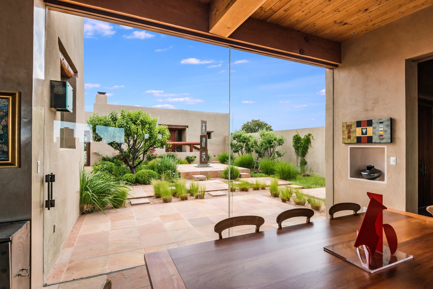 Dining area looking across courtyard to casita