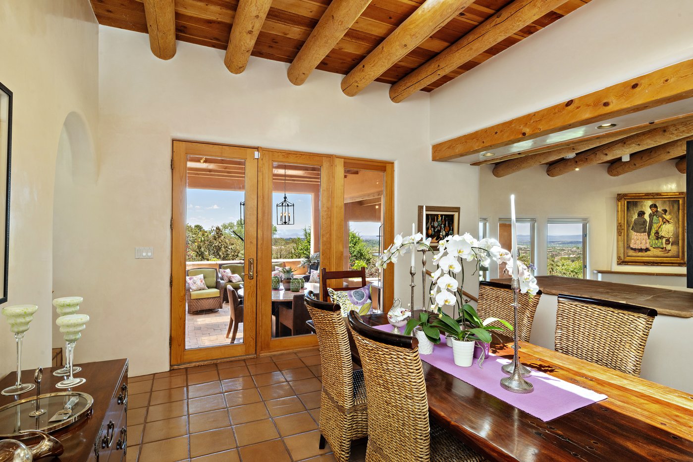 Formal dining room adjacent to exterior living and dining area